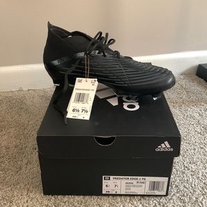 Brand new adidas cleats. Never worn, new with tags and box.